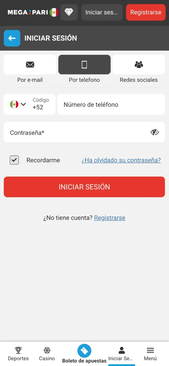 Inicio de sesión móvil con la pestaña de teléfono activa, la lada mexicana en el selector y el campo de contraseña.